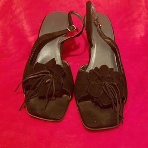 Black leather slingbacks with bow design. 9